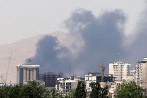 تصعيد متبادل بين إسرائيل وإيران.. غارات على طهران واعتراض صواريخ باتجاه النقب